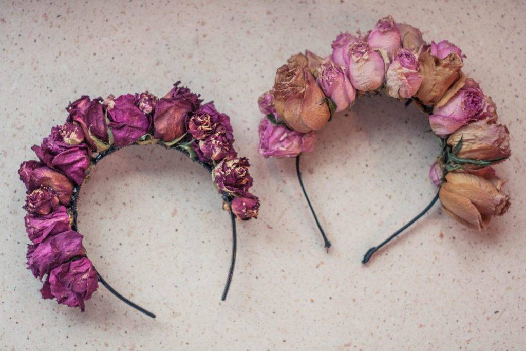 Two headbands made from dried roses.