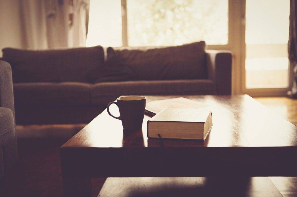 A coffee cup on a coffee table.