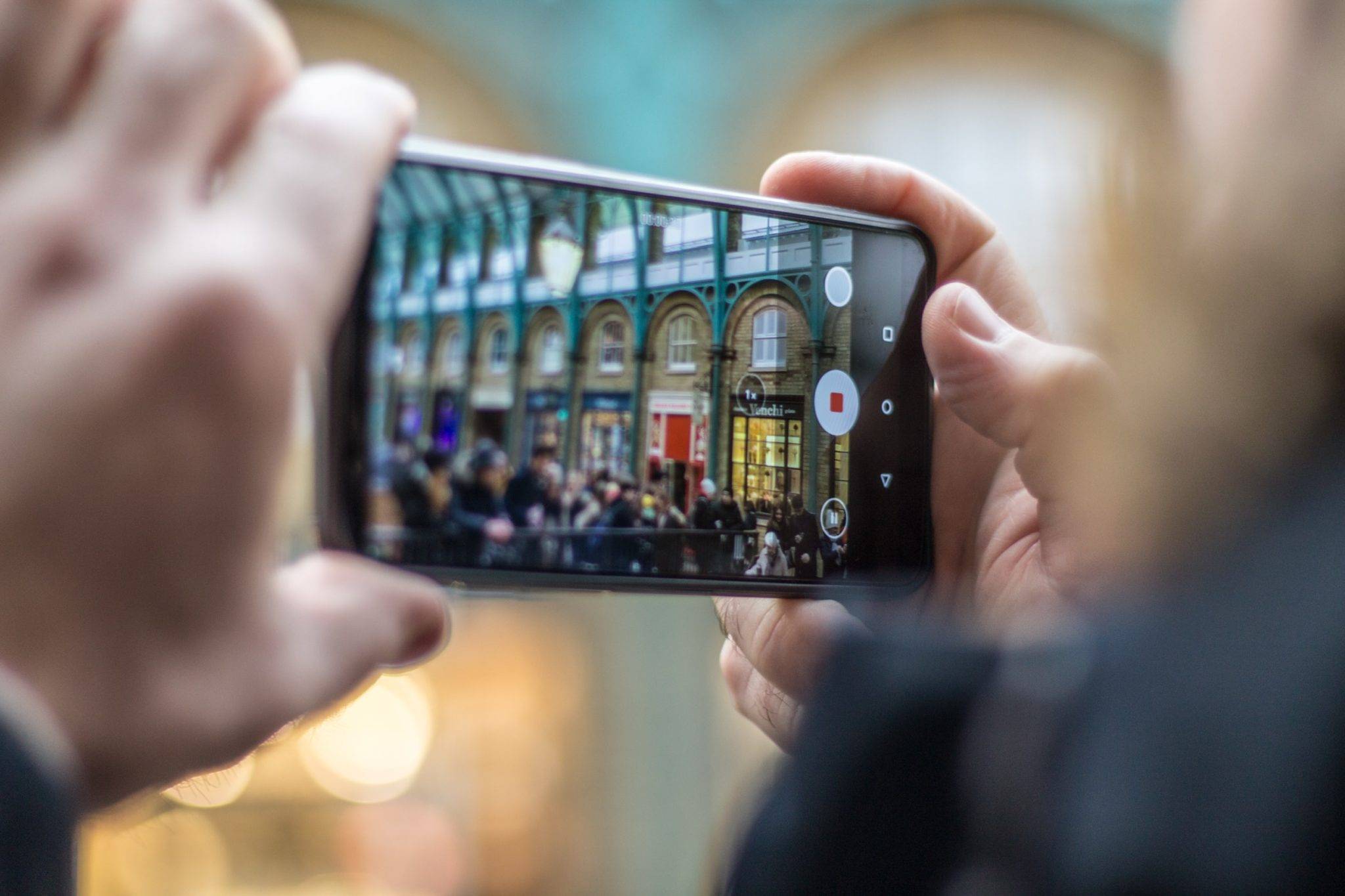 A person is taking a picture with their phone.