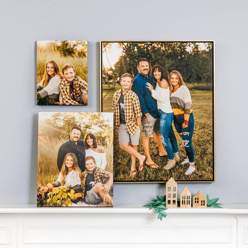 Three family photos on a mantle above a fireplace.