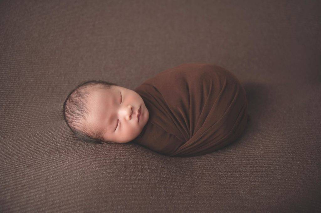 newborn photography, newborn in a wrap pose