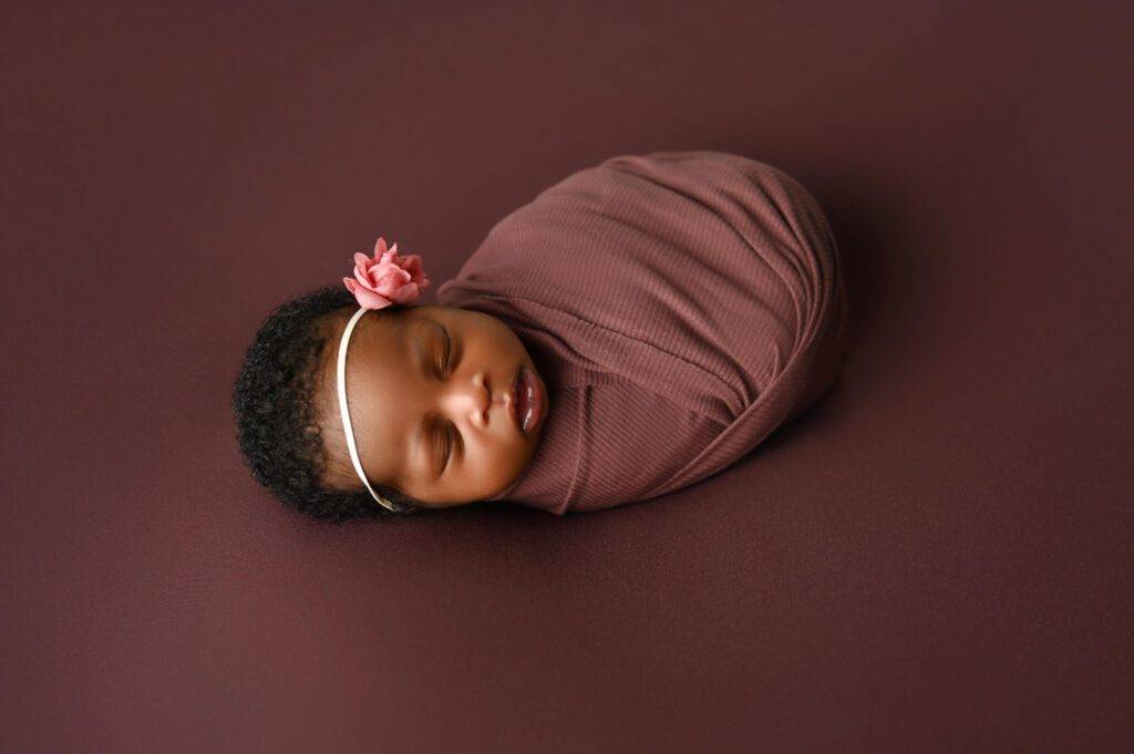 Newborn photographer in Candy Fox Photo studio in Katy