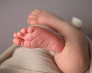 A close up of a baby's feet.