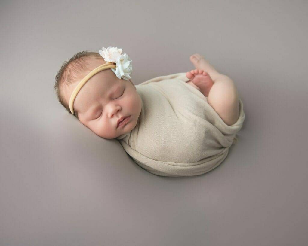 newborn photography, baby in cream wrap