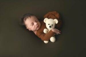 Choosing the Right Photographer for Your Newborn: Questions to Ask and Factors to Consider cover