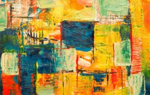 Abstract painting with vibrant colors including blue, yellow, green, orange, and red, featuring overlapping geometric shapes and textured brushstrokes.