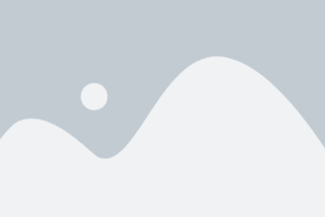 Placeholder image with a grey background, a light grey mountain-like shape, a circle representing the sun or moon, and no actual content displayed.