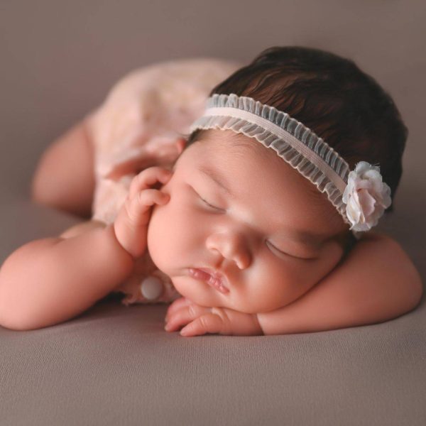 00008_C_041 newborn photographer in studio, posed with a headband, Saint Paul, MN
