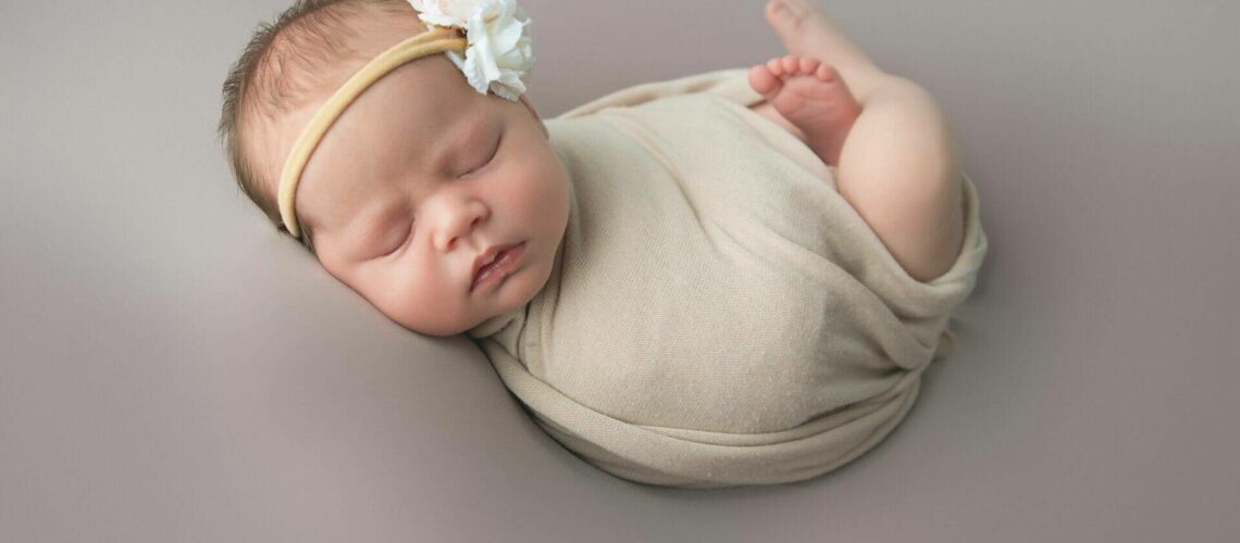 newborn photography, baby in cream wrap